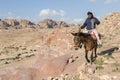 Petra, Jordan Ã¢â¬â December 24th, 2015: Bedouin man riding a horse